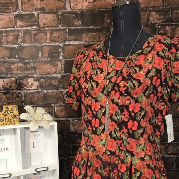 LuLaRoe Dresses & Skirts - LuLaRoe Amelia Dress with pockets New with tags